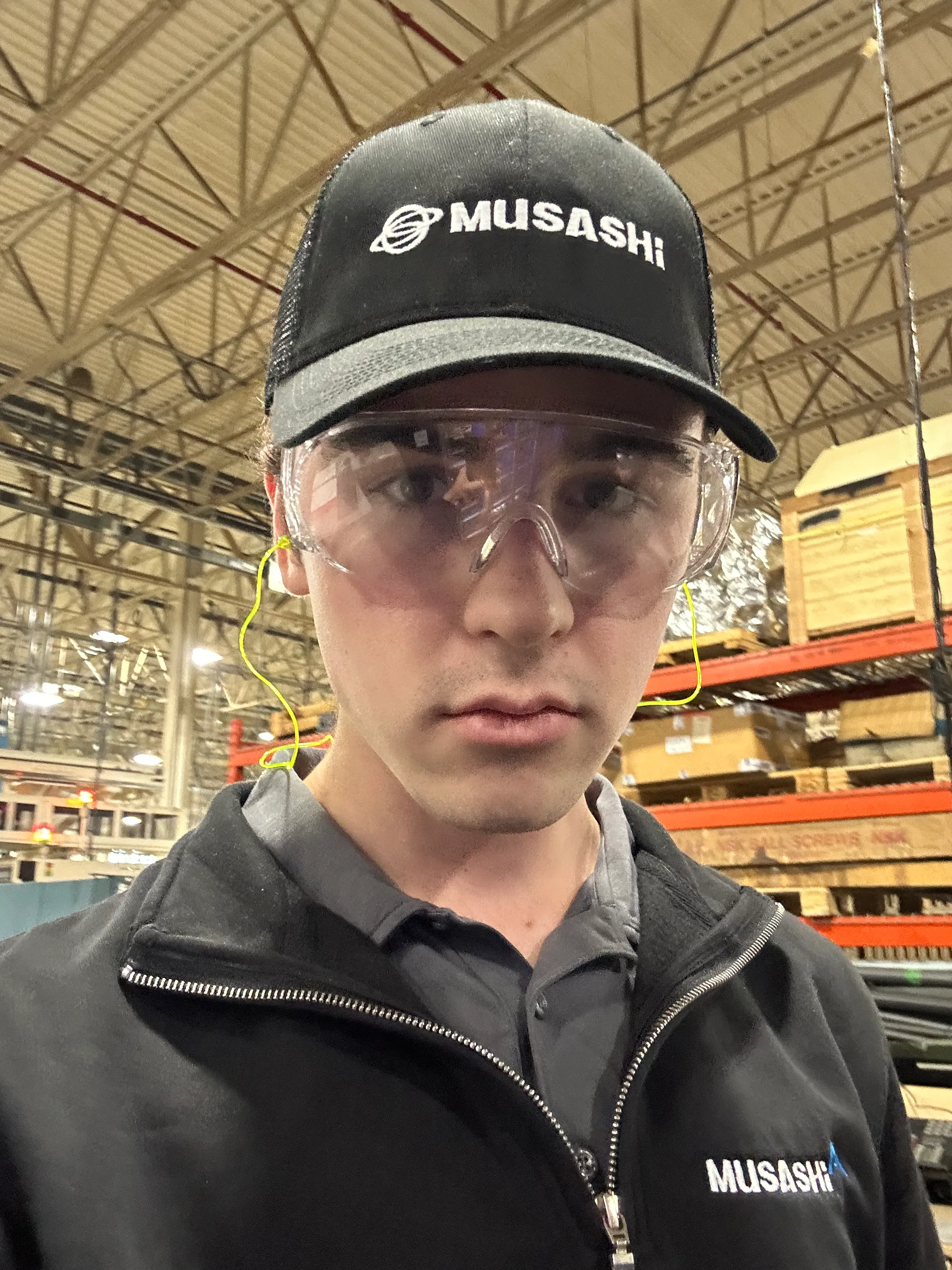 Me on the plant tour of the auto part manufacturing facilities